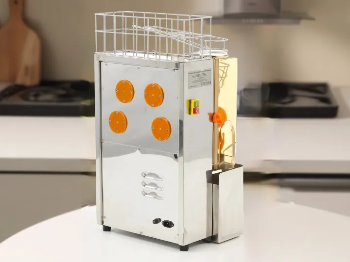 Exprimidor de naranjas profesional de acero inoxidable